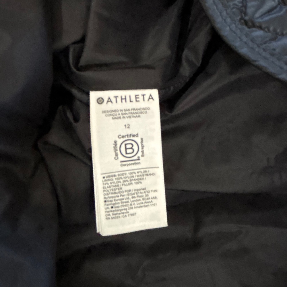 Athleta Size 12 Black Quilted Apres Ski Skirt Full Zip Front Knee Length - Picture 5 of 8